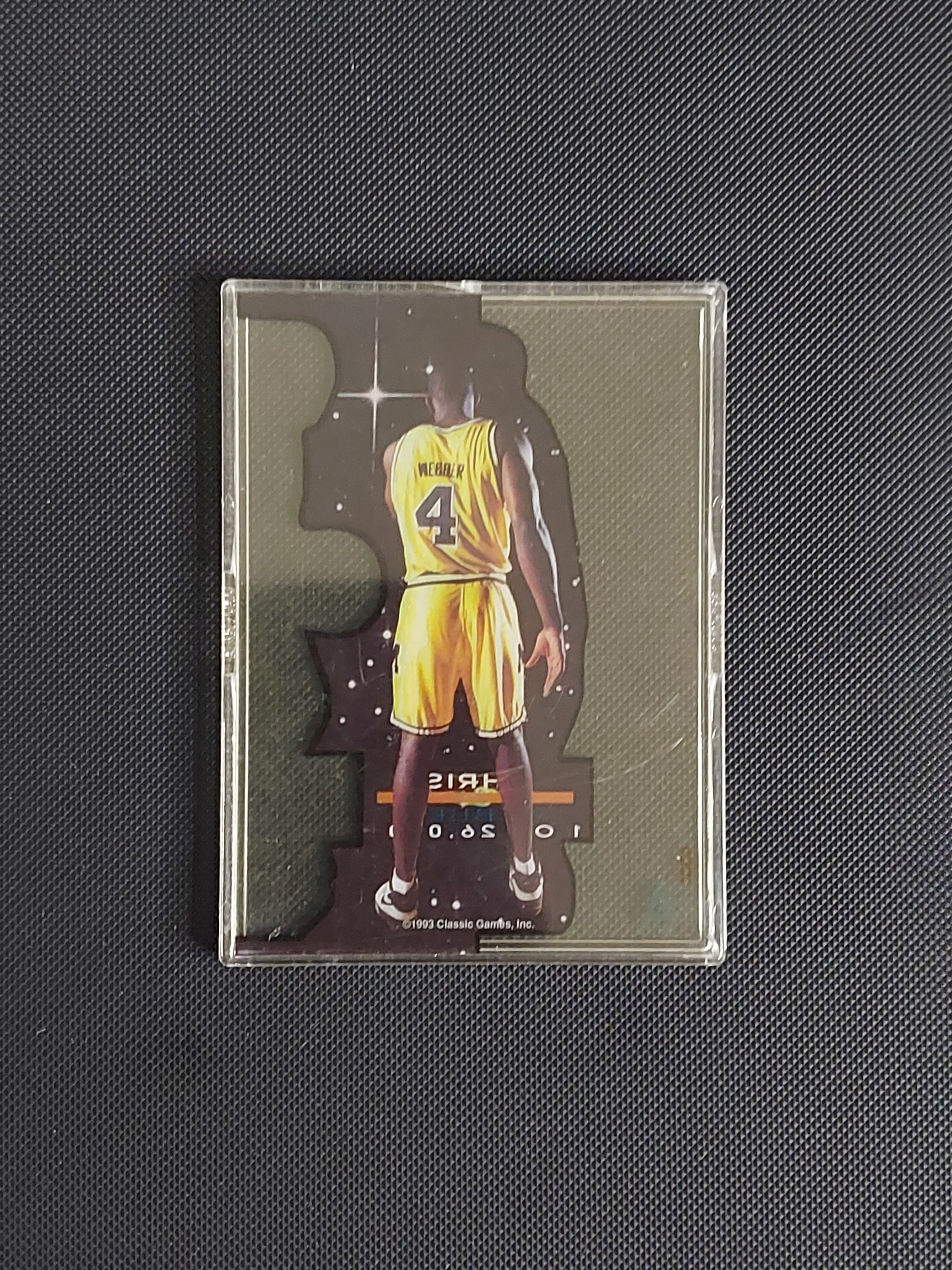 Back of 1993 Classic Draft Picks Chris Webber Acetate rookie card showing the limited 1 of 26,000 production designation and player details.