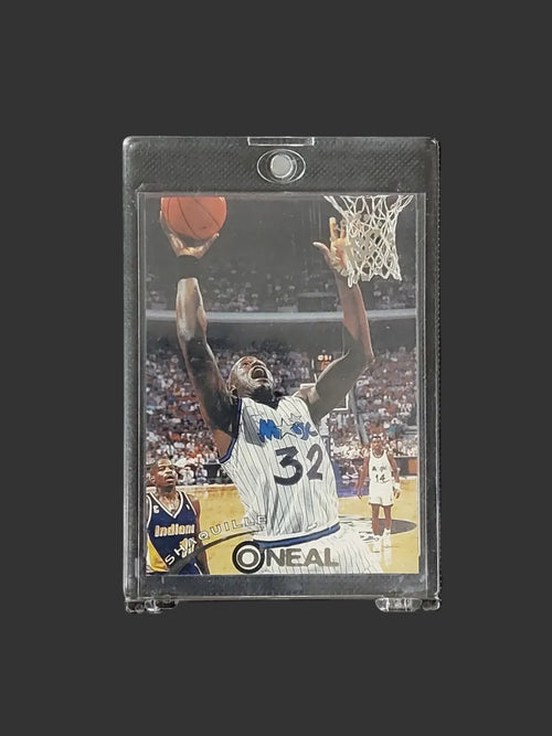 1994-95 Topps Stadium Club Shaquille O'Neal #32 basketball card front featuring Shaq with the Orlando Magic.