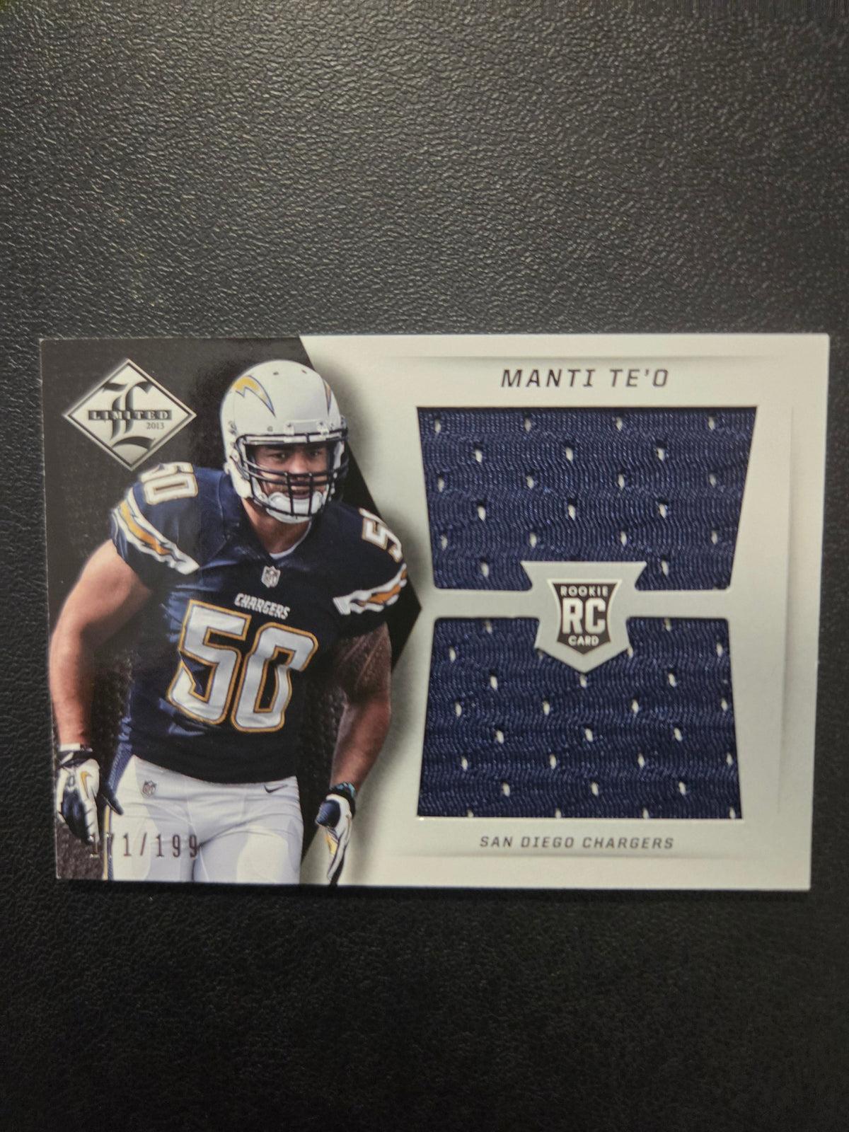 Front of 2013 Panini Limited Manti Te'o #22 Rookie Jumbo Jerseys RC Logo card numbered 171/199 with large navy Chargers jersey swatch.