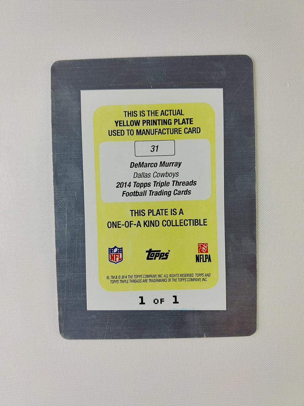 Back of the 2014 Topps Triple Threads DeMarco Murray #31 Yellow Printing Plate identifying the actual production plate and confirming it as 1 of 1.