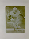 Front of the 2014 Topps Triple Threads DeMarco Murray #31 Yellow Printing Plate 1/1 featuring the Dallas Cowboys running back.