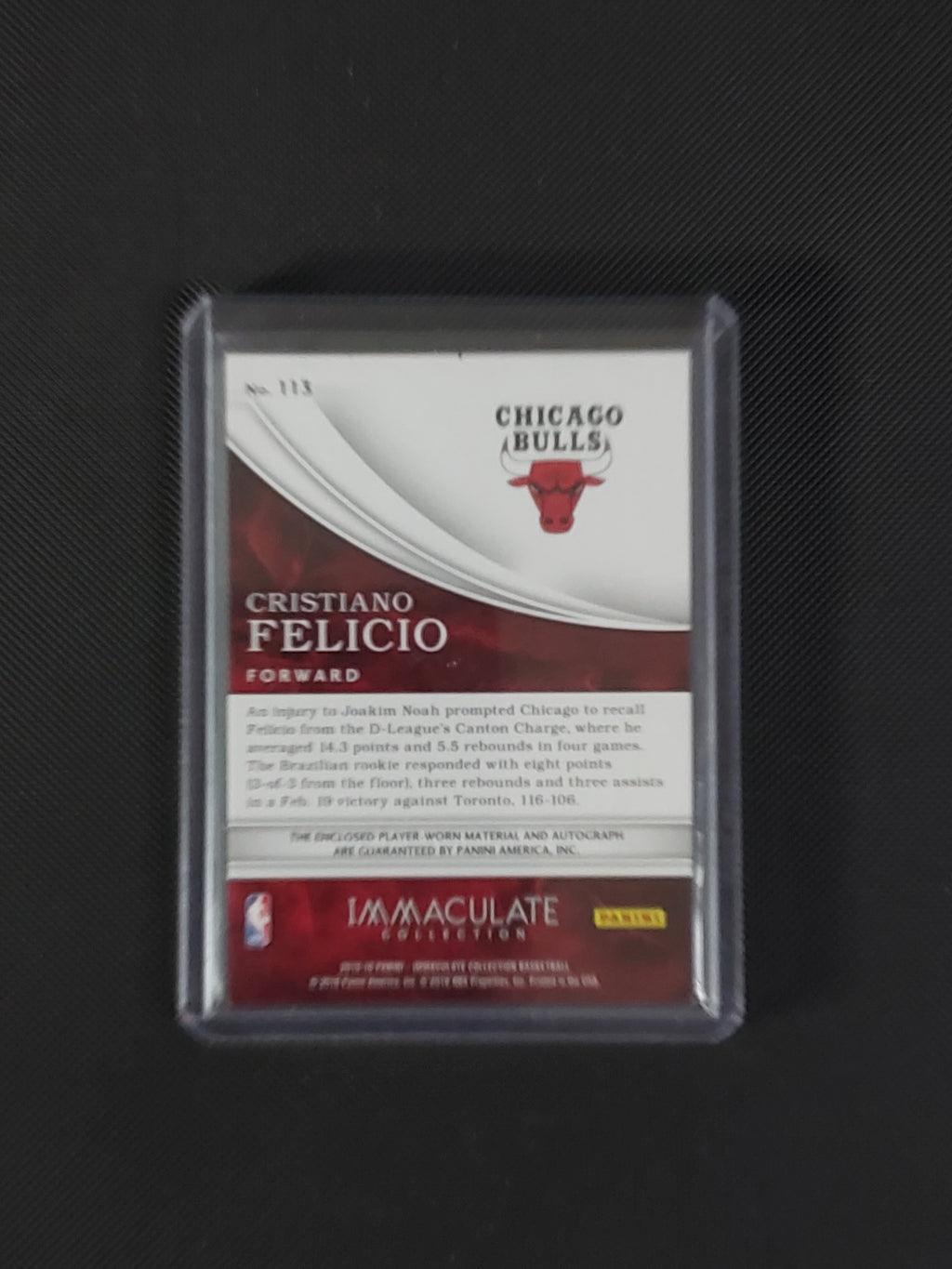 Back of Cristiano Felicio 2015-16 Panini Immaculate Rookie Patch Autograph #113 showing Chicago Bulls card information and 10/99 serial numbering.