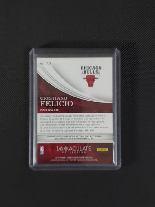 Back of Cristiano Felicio 2015-16 Panini Immaculate Rookie Patch Autograph #113 showing Chicago Bulls card information and 10/99 serial numbering.