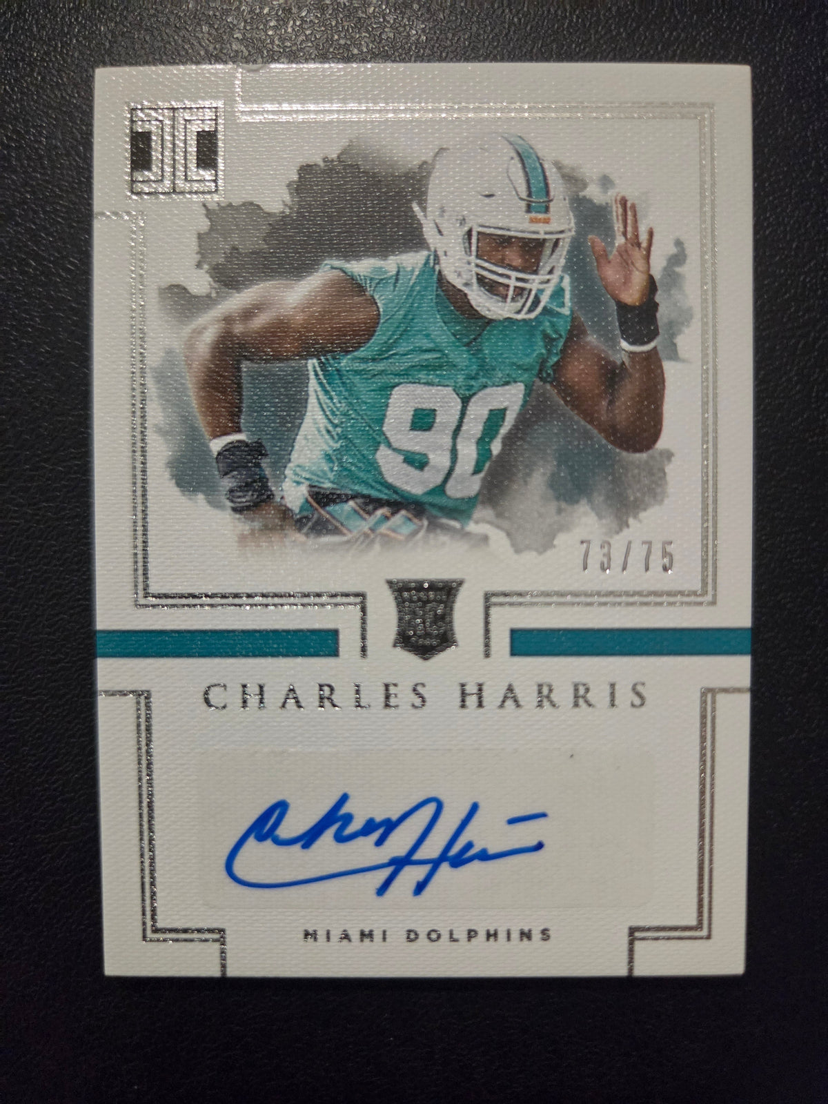 Front of 2017 Panini Impeccable Charles Harris #150 Miami Dolphins rookie autograph serial numbered 73/75 with blue on-card signature.
