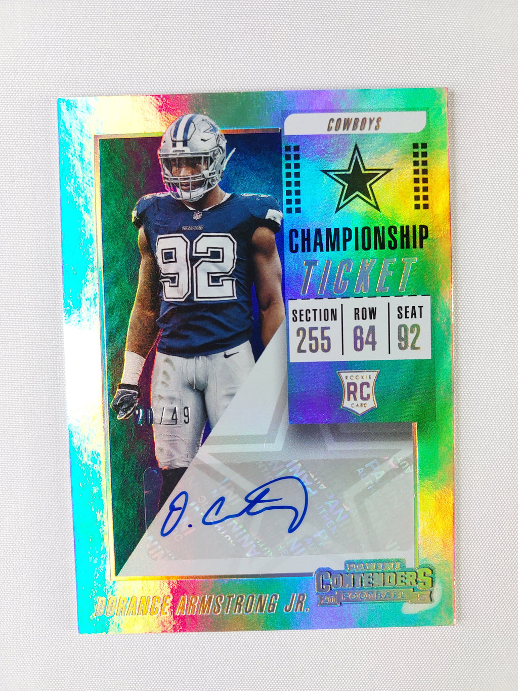 Front of 2018 Panini Contenders Dorance Armstrong Jr. Championship Ticket rookie autograph #215, first serial numbered 01/49 for the Dallas Cowboys.