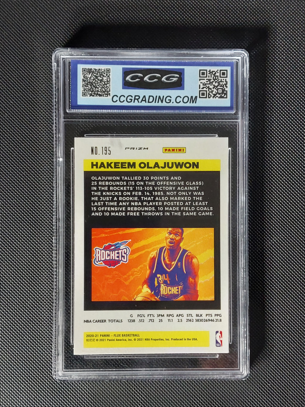 Back of 2020-21 Panini Flux Hakeem Olajuwon #195 Silver Pulsar Prizm CCG 10 showing Houston Rockets card details.