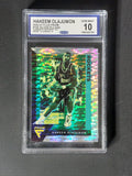 Front of 2020-21 Panini Flux Hakeem Olajuwon #195 Silver Pulsar Prizm graded CCG Gem Mint 10.