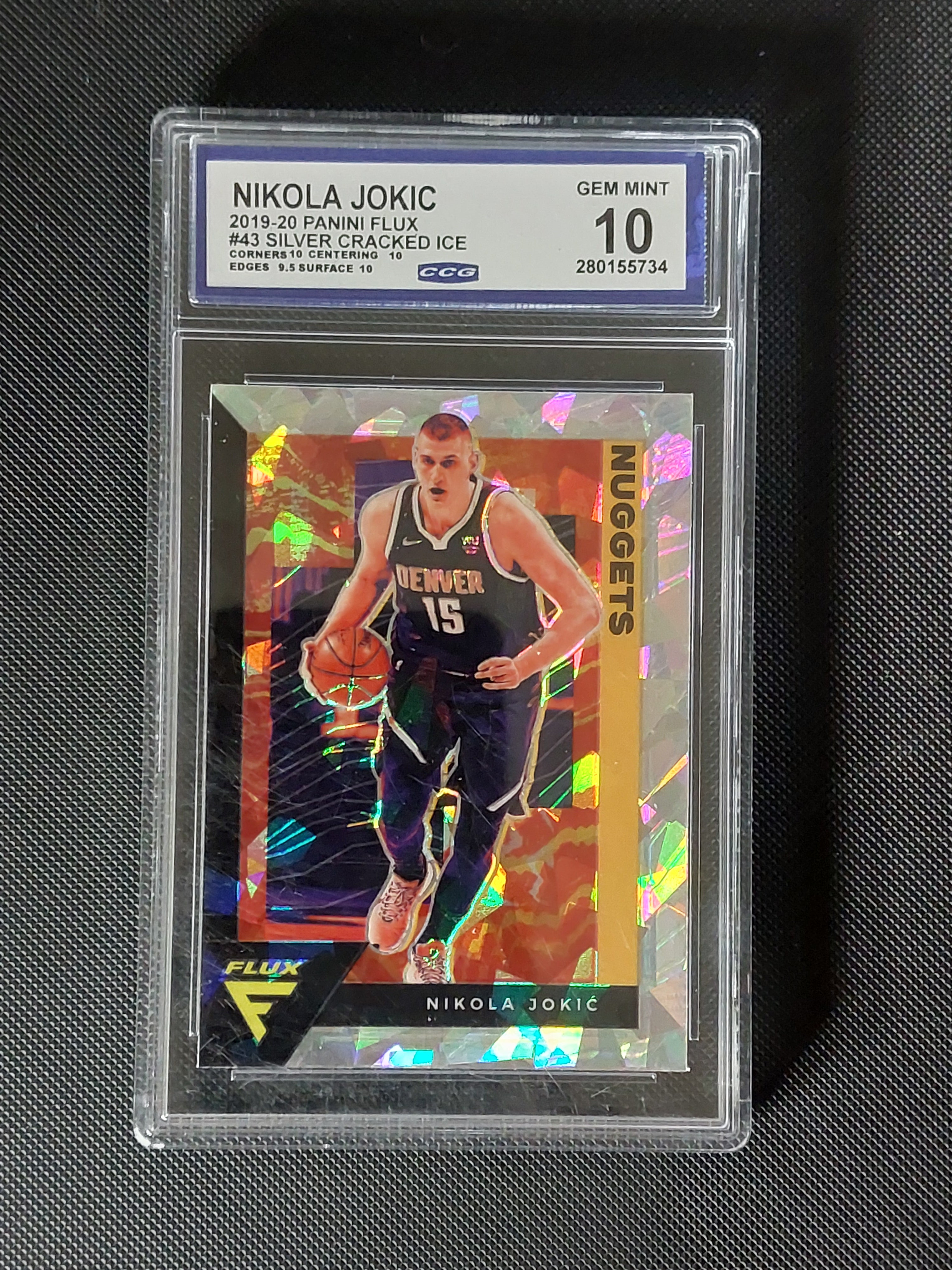 Front of 2020-21 Panini Flux Nikola Jokic #43 Silver Cracked Ice Denver Nuggets basketball card graded CCG Gem Mint 10.