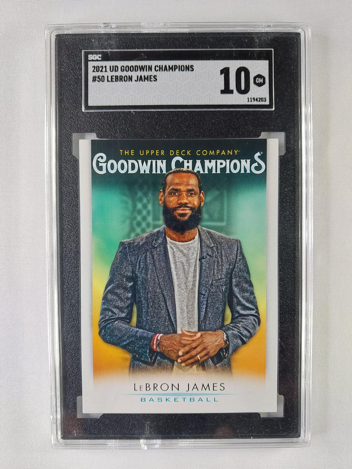 2021 Upper Deck Goodwin Champions LeBron James #50 basketball card graded SGC 10 GEM with certification number 1194203.