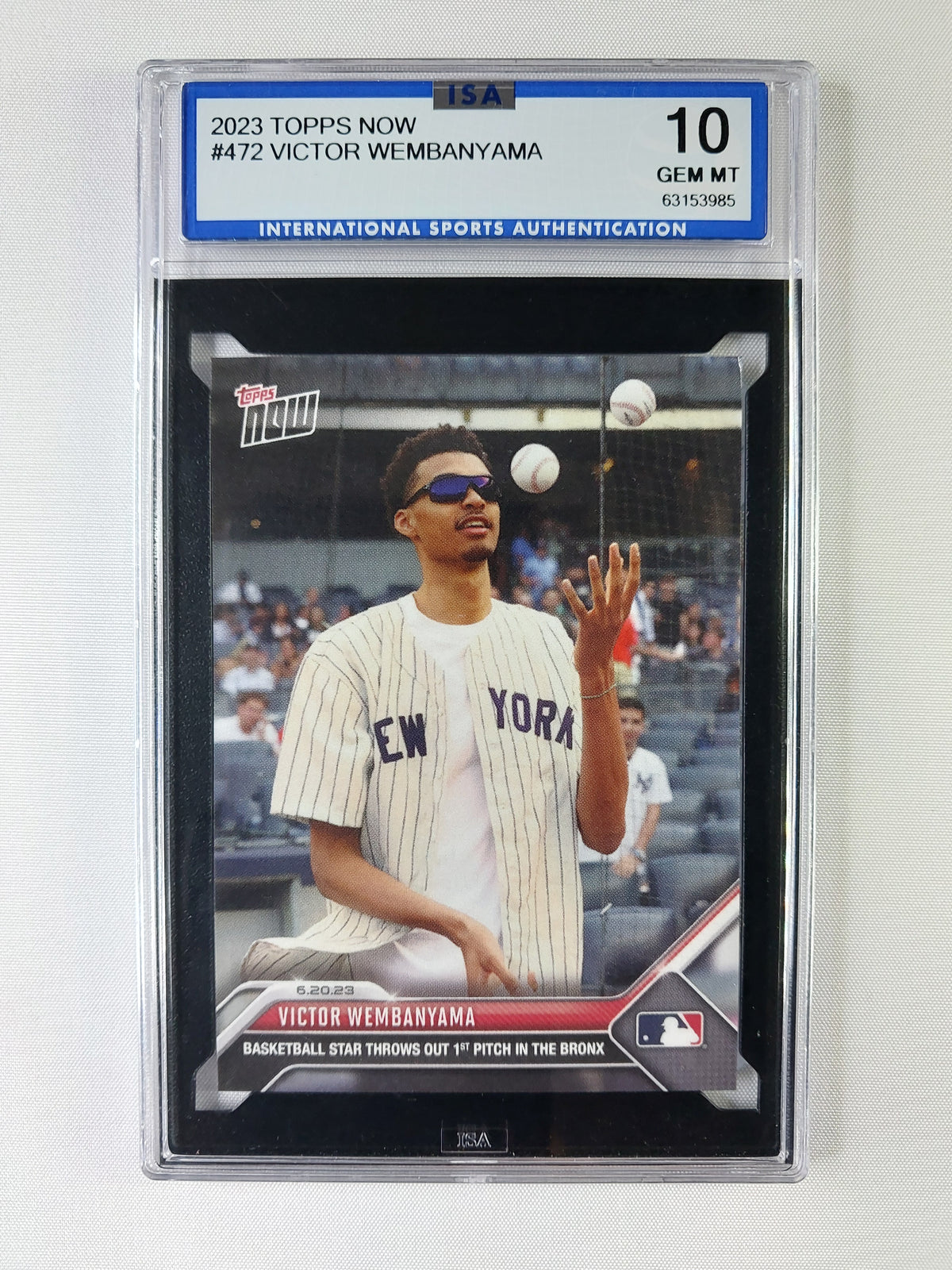 Front of 2023 Topps NOW Victor Wembanyama #472 Yankee Stadium first pitch rookie-year card graded ISA 10 GEM MT.