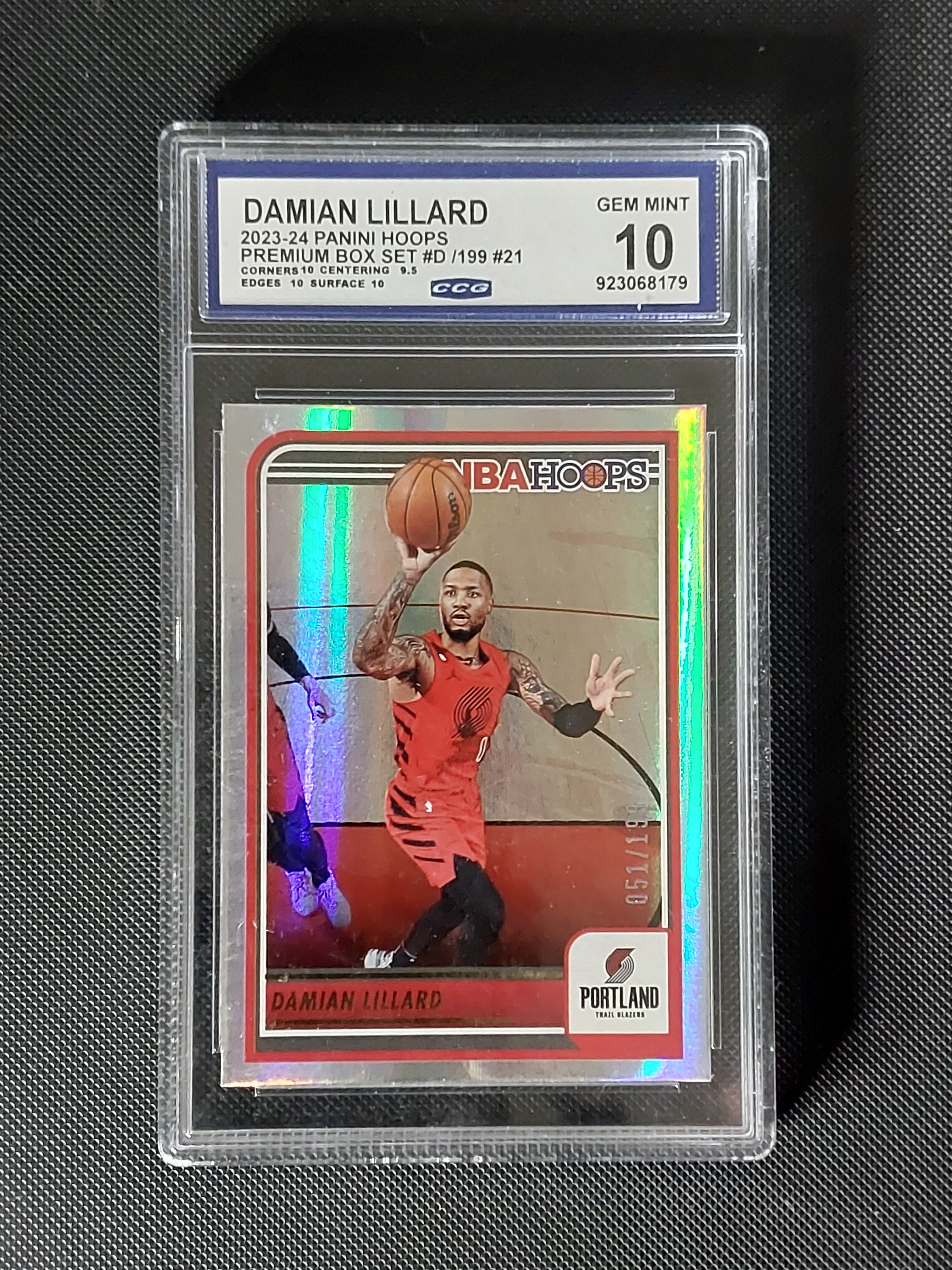 Front of 2023-24 Panini NBA Hoops Damian Lillard #21 Premium Box Set numbered 50/199 and graded CCG Gem Mint 10