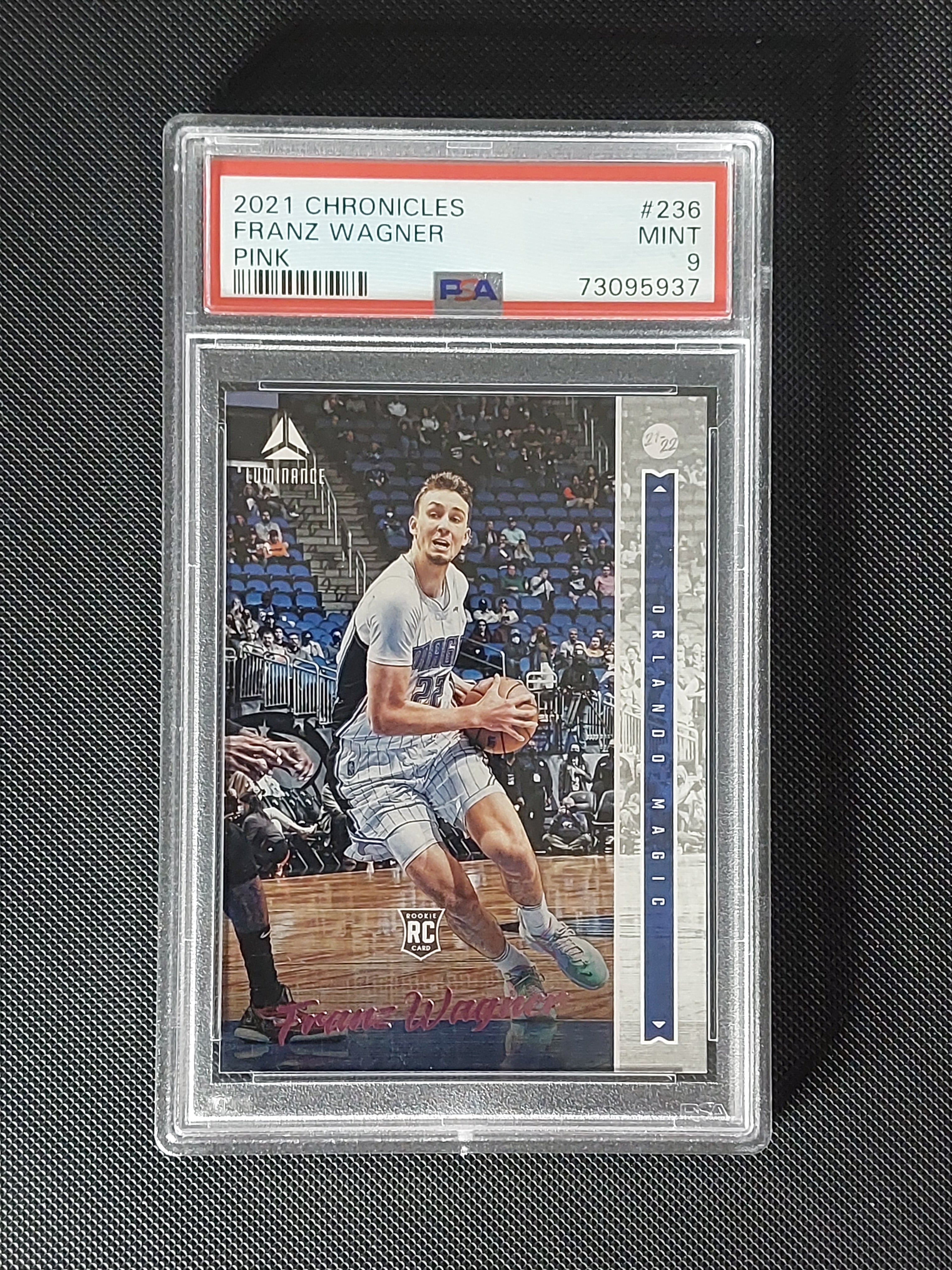 Front of 2021-22 Panini Chronicles Luminance Franz Wagner #236 Pink Rookie Card graded PSA Mint 9