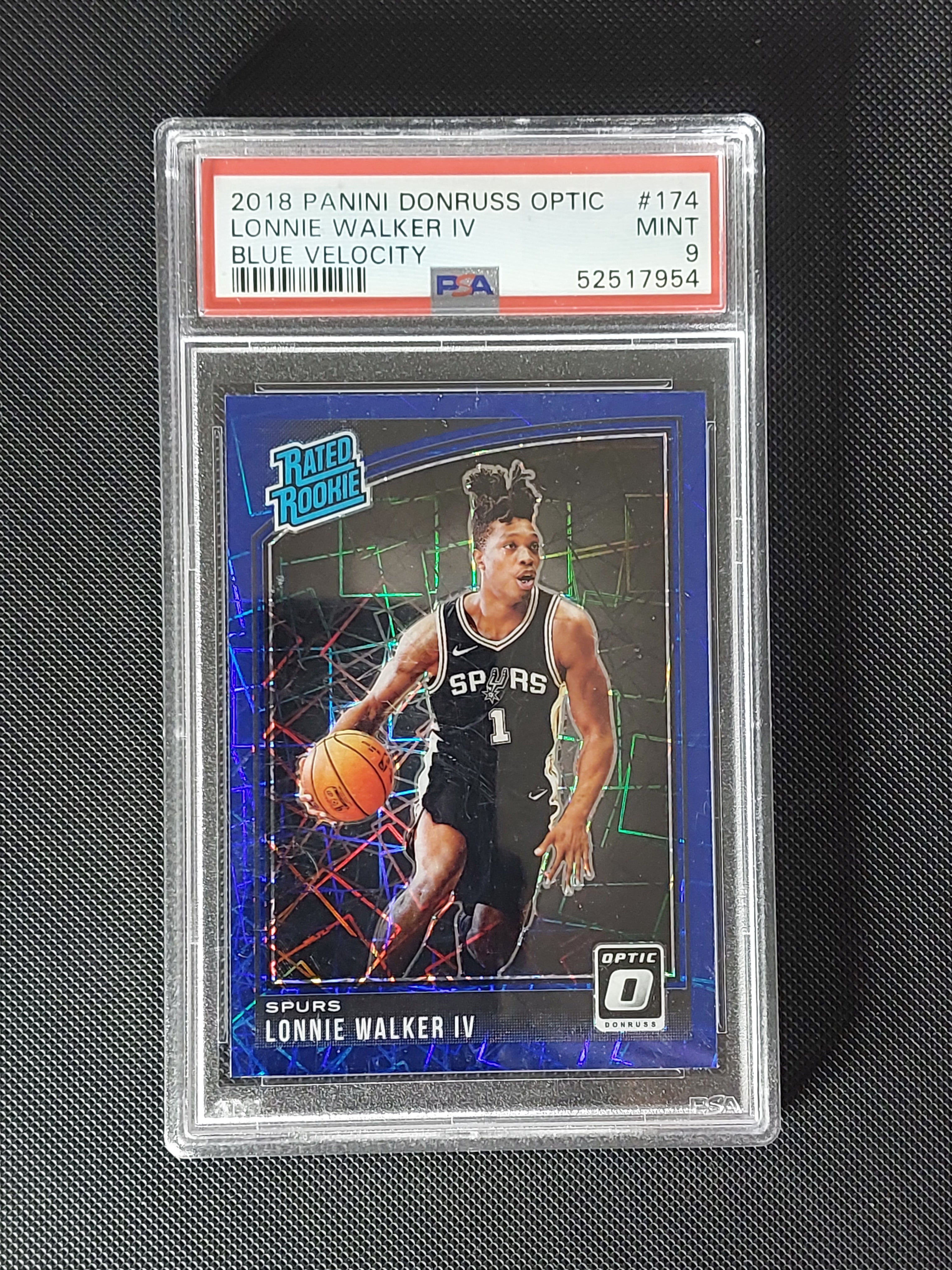 Front of 2018-19 Panini Donruss Optic Lonnie Walker IV #174 Blue Velocity Rated Rookie graded PSA Mint 9