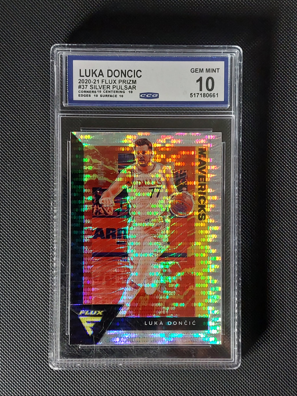 Front of 2020-21 Panini Flux Luka Dončić #37 Silver Pulsar Prizm graded CCG Gem Mint 10 showing certification 517180661 and four 10 subgrades