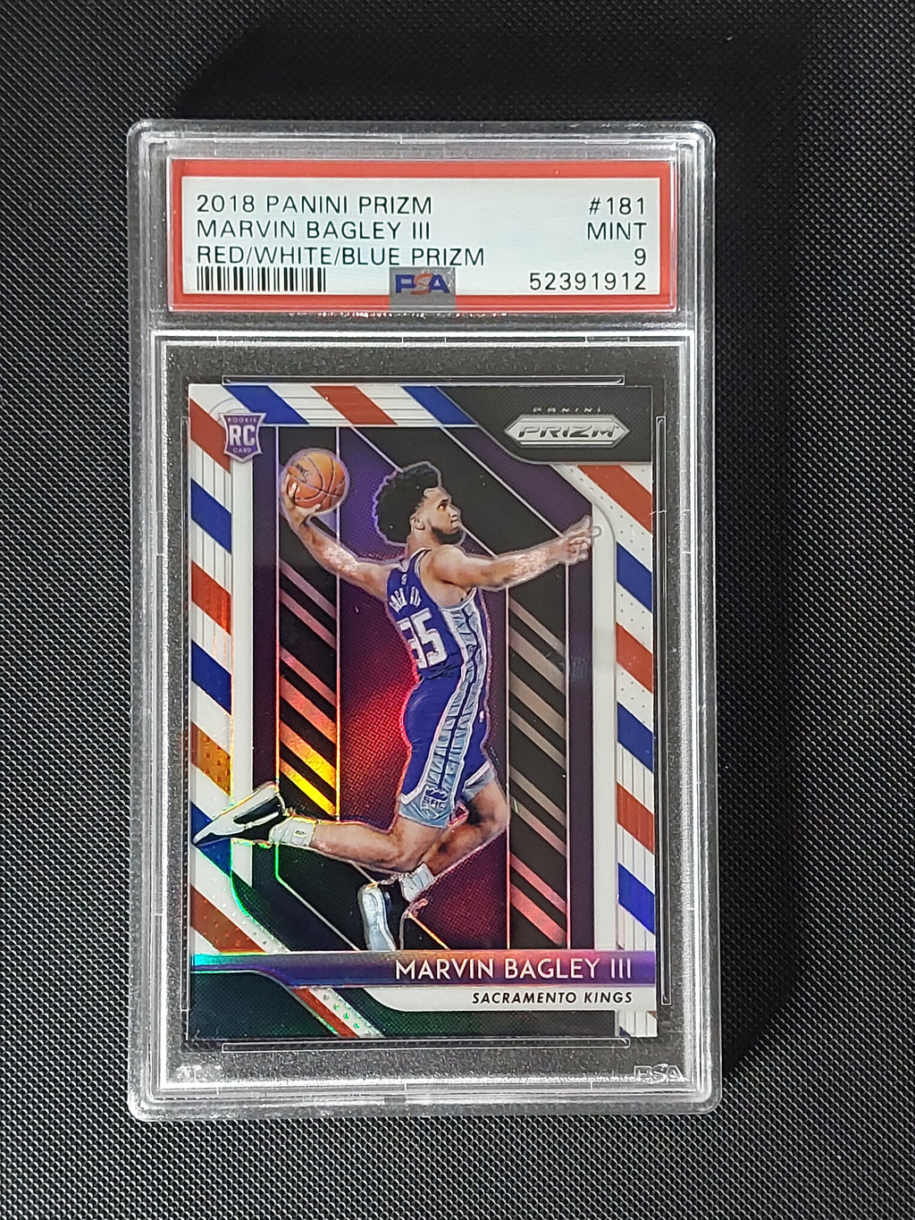 Front of 2018-19 Panini Prizm Marvin Bagley III #181 Red White & Blue Prizm Rookie graded PSA Mint 9