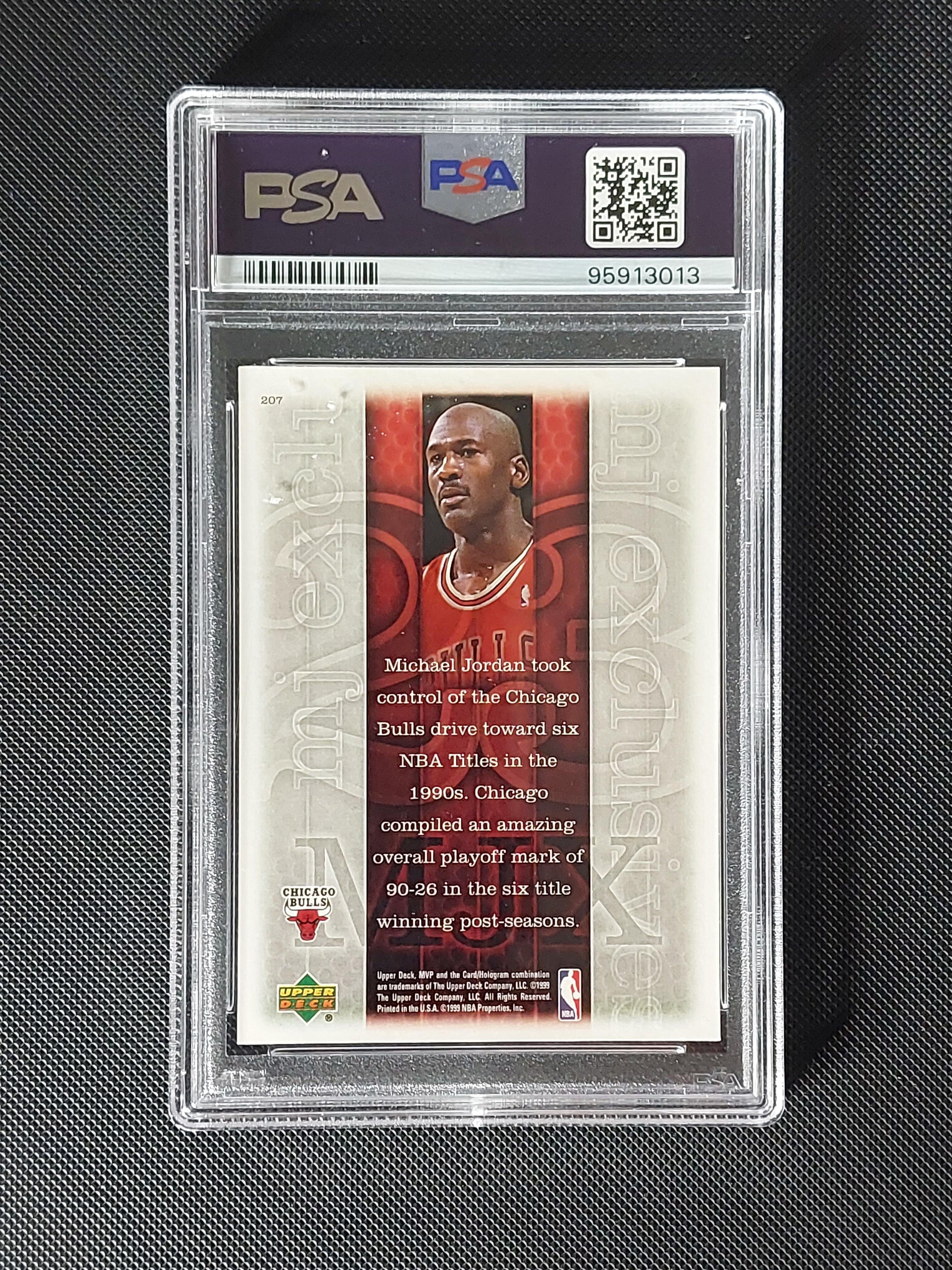 Back of 1999-00 Upper Deck MVP Michael Jordan #201 MJ Exclusives PSA Mint 9 card in PSA slab.
