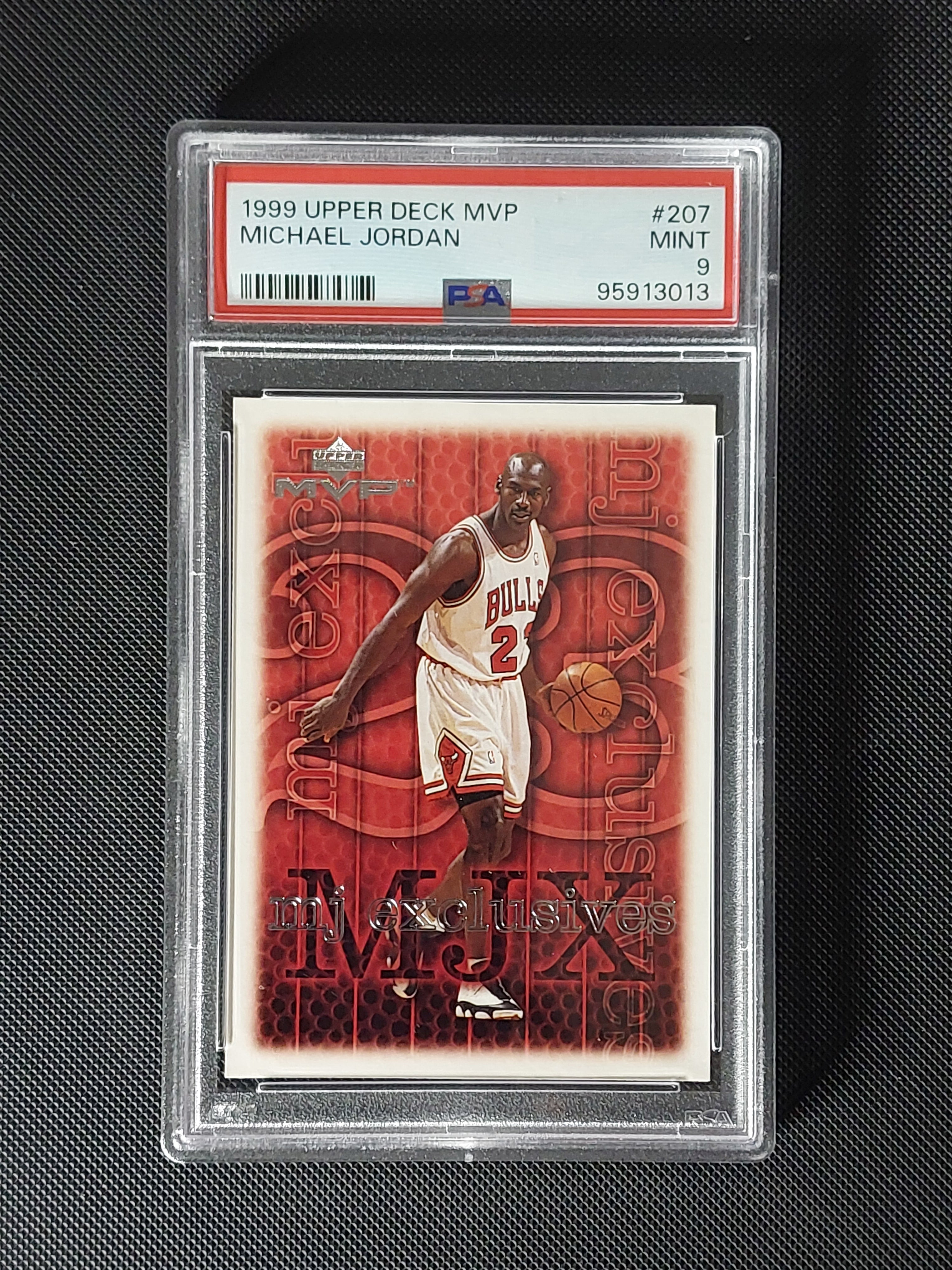 Front of 1999-00 Upper Deck MVP Michael Jordan #201 MJ Exclusives graded PSA Mint 9 showing Chicago Bulls artwork