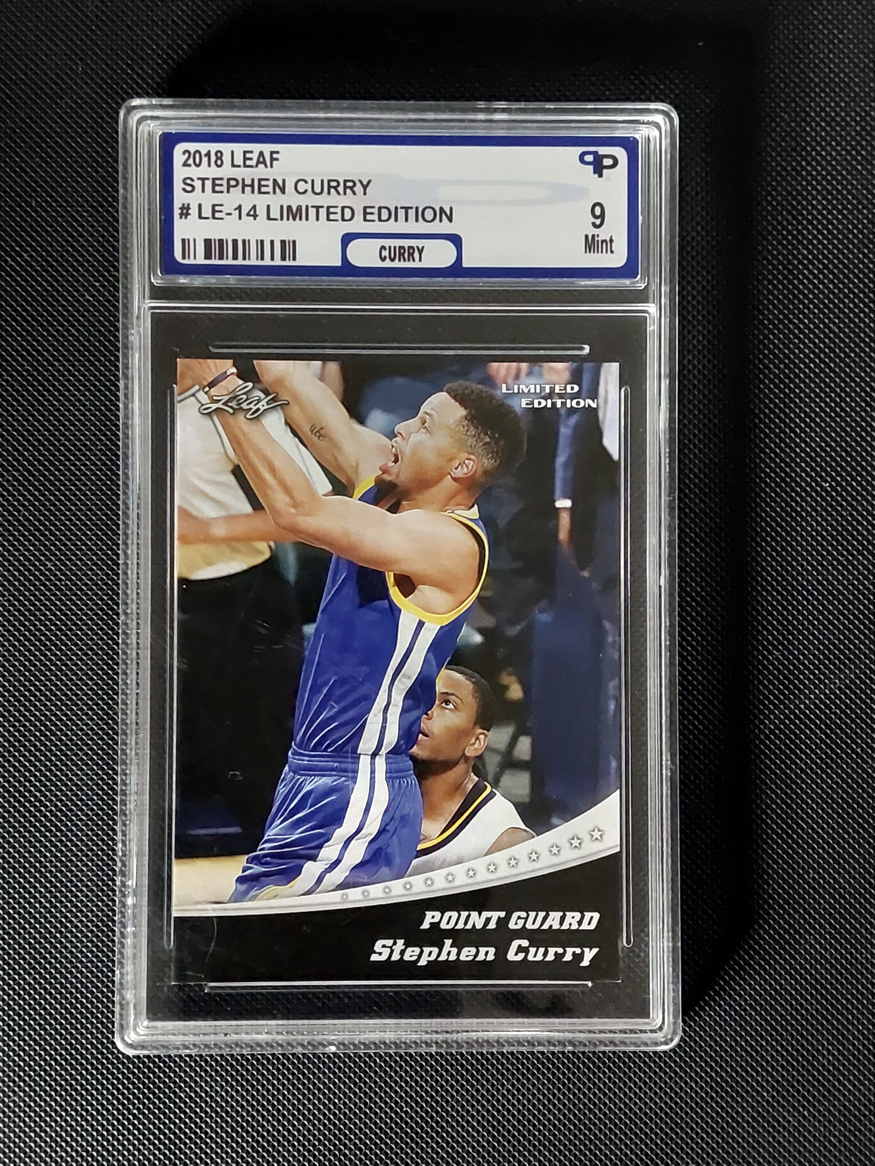 Front of 2018 Leaf Limited Edition Stephen Curry #LE-14 graded PPG Mint 9 showing Golden State Warriors action image