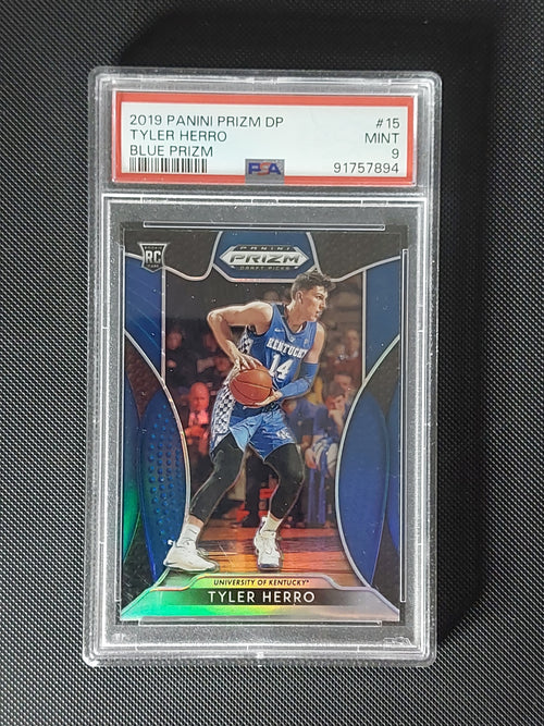 Front of 2019 Panini Prizm Draft Picks Tyler Herro #15 Blue Prizm Rookie Card graded PSA Mint 9