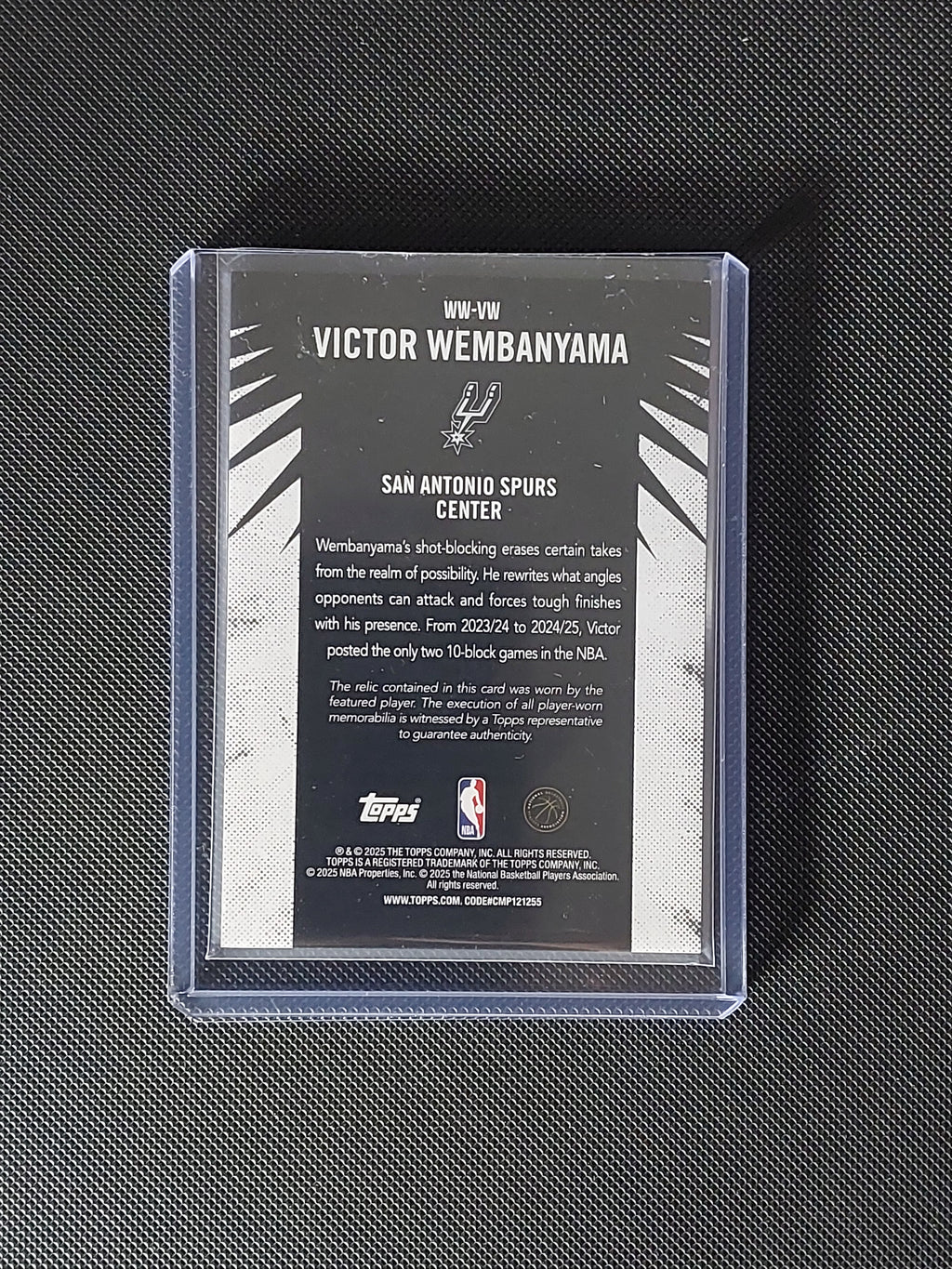 Back of 2025-26 Topps Victor Wembanyama Woven Wonders Relics #WW-VW showing San Antonio Spurs and relic card information.